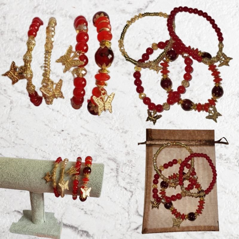 Set de 4 bracelets rouges à breloques papillons